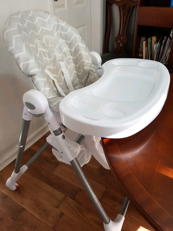 high chair with basket underneath